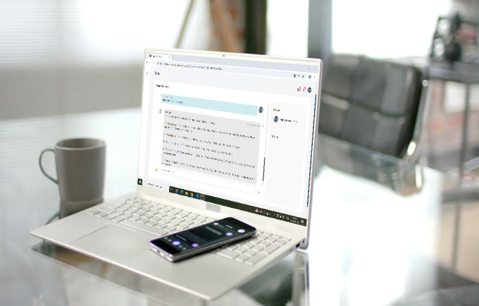 AI chatbot answering project management queries on laptop screen